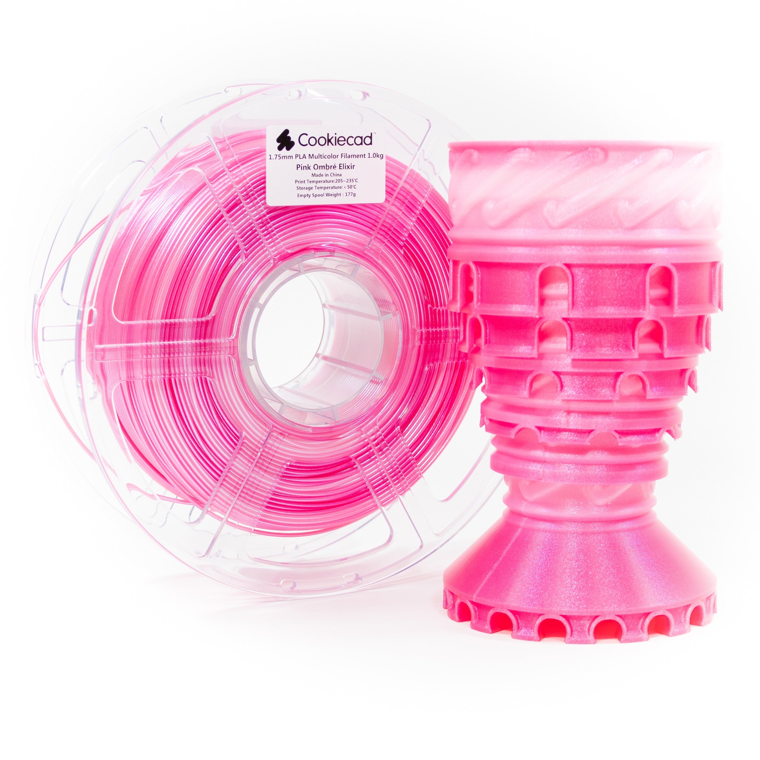 Cookiecad Pink Ombré PLA filament spool with a 3D print